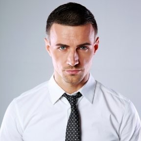 demo attachment 373 portrait of a confident man over gray background PDL3Q9F